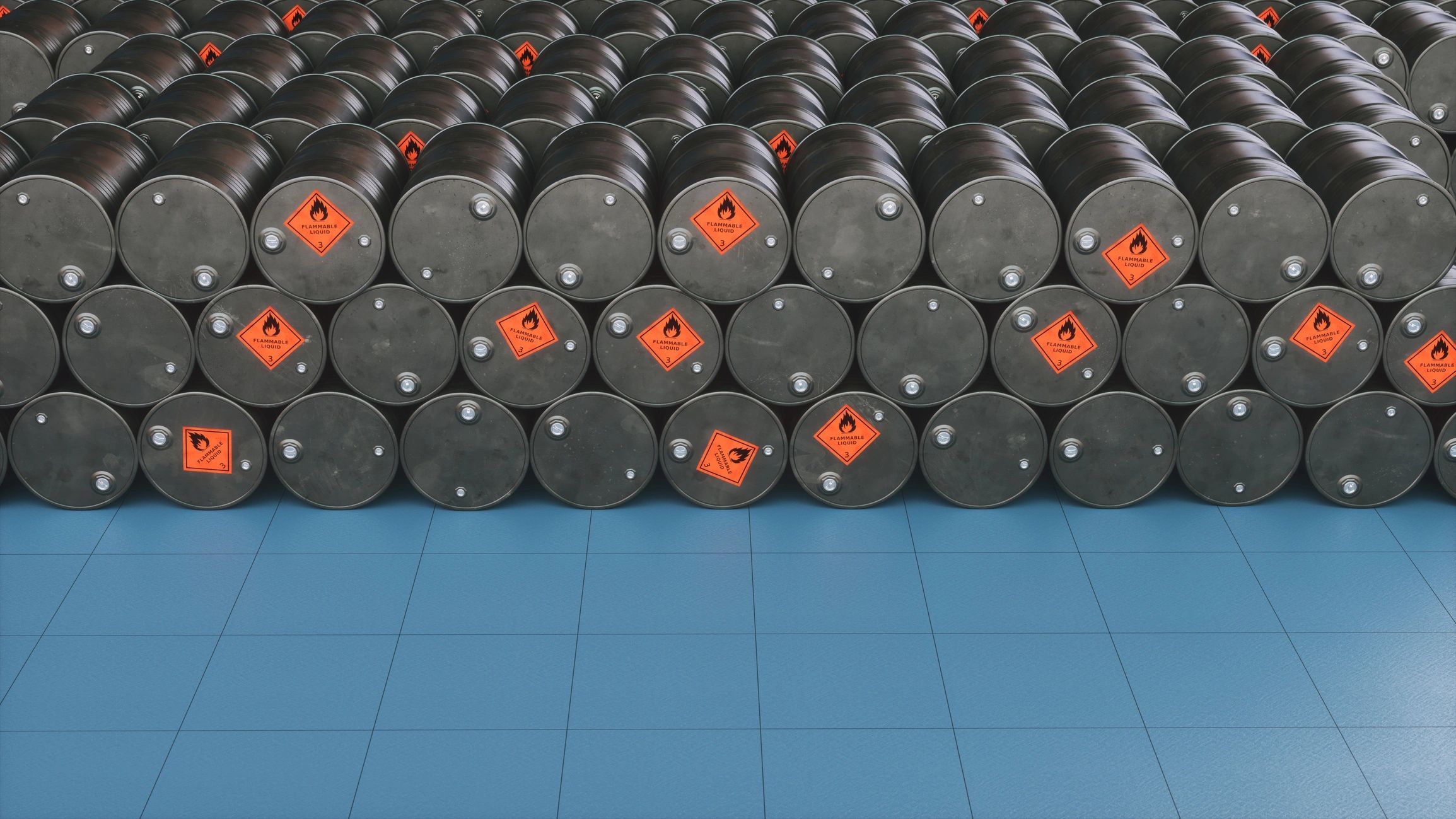 Large neat stack of fuel barrels